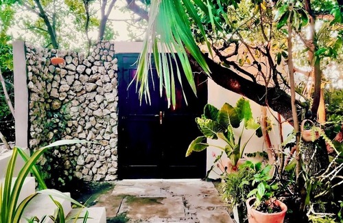 Tofinho Villa | Peaceful and secluded beach house with a private tropical garden