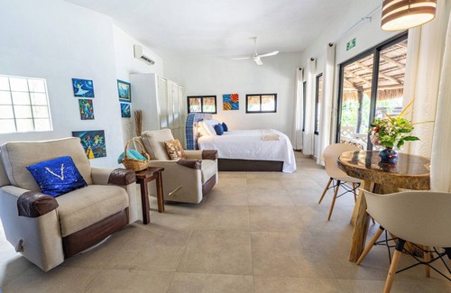 Isla Mujeres House | Peaceful cottage on the beach with heated pool, sunsets and tropical gardens