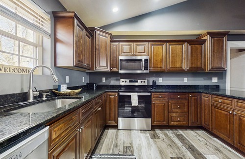 Kodak Cabin | Peaceful family-friendly home with games, hot tub, fire pit, and great location!
