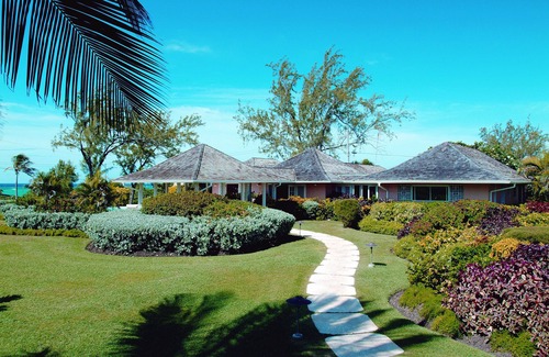 Long Bay Villa | Peaceful family getaway in tropical gardens steps away from beach. WiFi; AC; BBQ