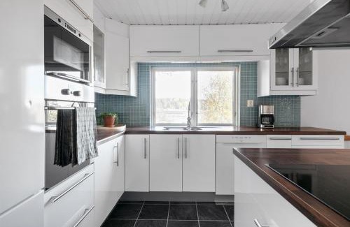 Osteraker House | Peaceful family home with indoor fireplace