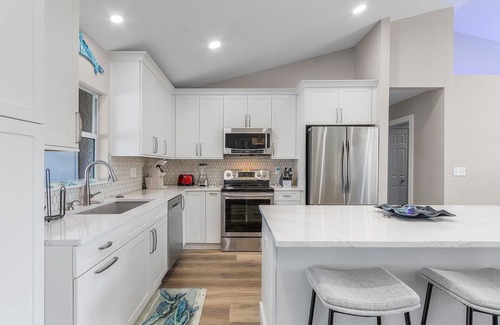 Trafalgar House | Peaceful fresh water canal home with heated pool. Incredible Value.