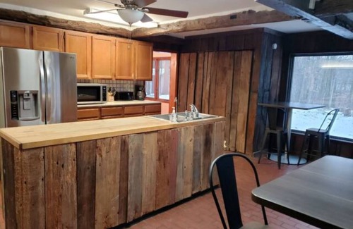 Delton House | Peaceful Lake House with pontoon boat rental on property.n