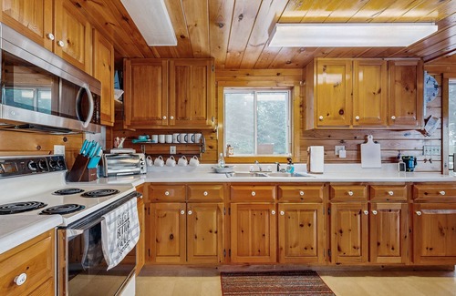 Otis House | Peaceful Lakefront Escape with Outdoor Dining, Beach Access, Deck & Firepit