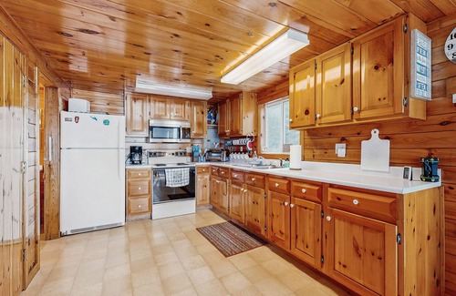 Otis House | Peaceful Lakefront Escape with Outdoor Dining, Beach Access, Deck & Firepit