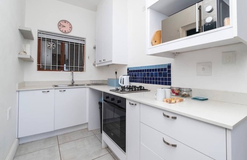 Glencairn Apartment | Peaceful Ocean-View Apartment with Balcony