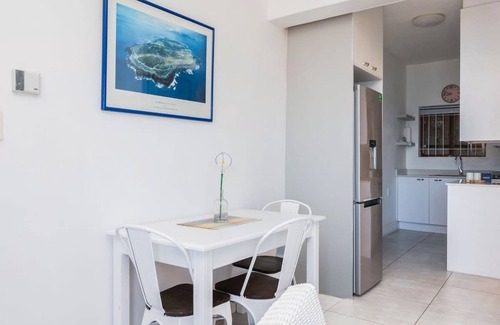 Glencairn Apartment | Peaceful Ocean-View Apartment with Balcony