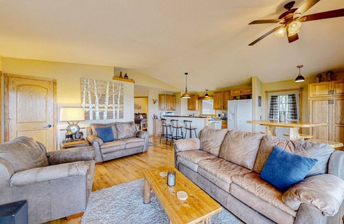 Wisconsin Dells House | Peaceful river view home with a furnished deck, firepit, central AC, & WiFi
