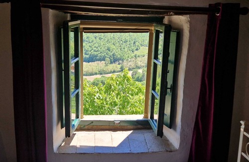 San Leo Bastia House | Peaceful rustic house with stunning views, garden and pergola.