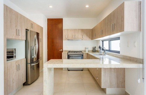 Playa del Carmen House | Peaceful Townhome, Pool, Gym & Paddle Court
