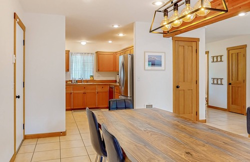 Clinton House | Peaceful, tree-lined home near Clinton with large yard, fireplace & Peloton