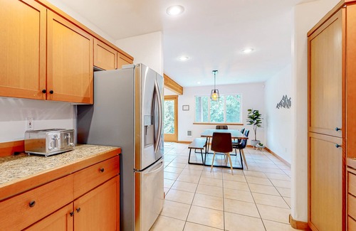 Clinton House | Peaceful, tree-lined home near Clinton with large yard, fireplace & Peloton