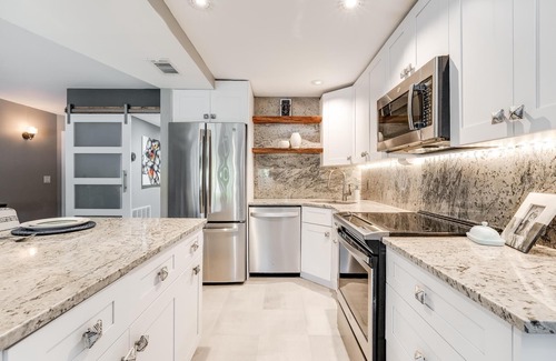Florida North Atlantic Coast Condo | Peaceful Waterfront View! River House condominium 100% Newley remodeled