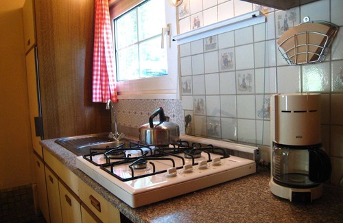 Dilsen-Stokkem Ski Chalet | Peacefully situated chalet surrounded by woods