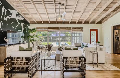 Parrot Cove House | Peacock Oasis - Retro Vibes and Poolside Lounging in Parrot Cove