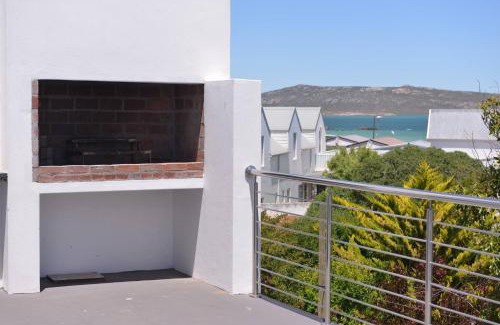 Langebaan House | Pelican Cove is a Modern 4-Bedroom Holiday Home in Langebaan with some Sea Views