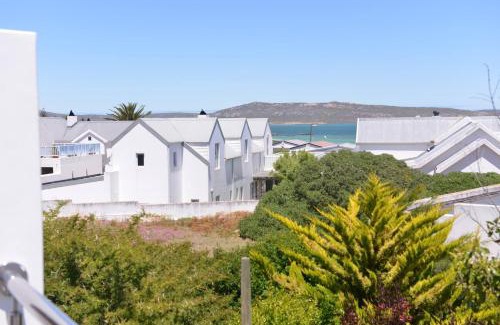 Langebaan House | Pelican Cove is a Modern 4-Bedroom Holiday Home in Langebaan with some Sea Views