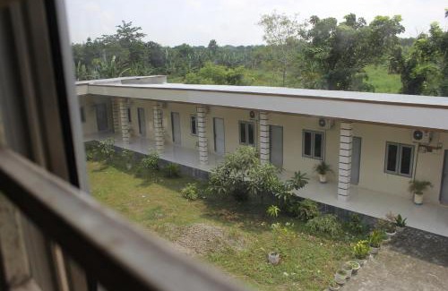 Medan House | Penginapan Transit Tomato