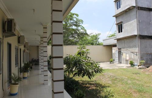 Medan House | Penginapan Transit Tomato
