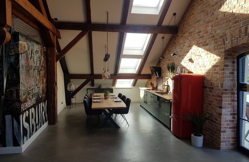 Nordstadt Apartment | Penthouse at the old arsenal - fireplace, WLAN, bathtub, shower, balcony