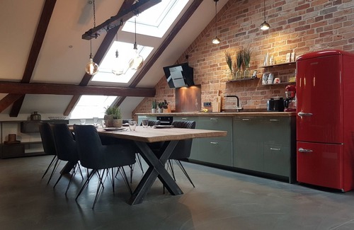 Nordstadt Apartment | Penthouse at the old arsenal - fireplace, WLAN, bathtub, shower, balcony