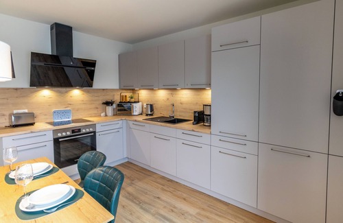 Tossens Apartment | Penthouse Lotta - view of the greenery. Stylish. Family-friendly. Quiet.
