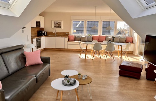 Carolinensiel Apartment | ☼ Penthouse on the Harle ☼ Uniquely beautiful living right on the water + sauna, fireplace