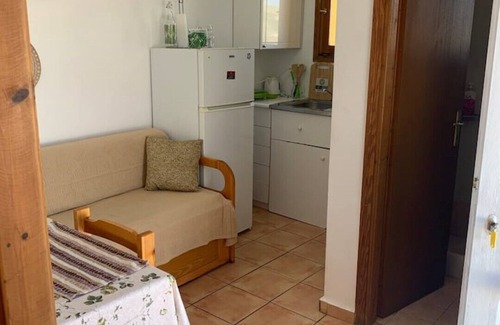 Krotiri Apartment | Penthouse studio overlooking Paroikia Bay!