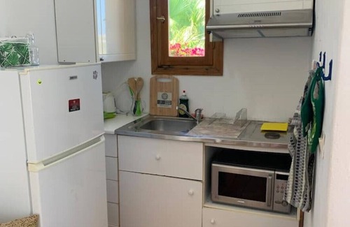 Krotiri Apartment | Penthouse studio overlooking Paroikia Bay!