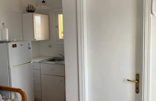 Krotiri Apartment | Penthouse studio overlooking Paroikia Bay!