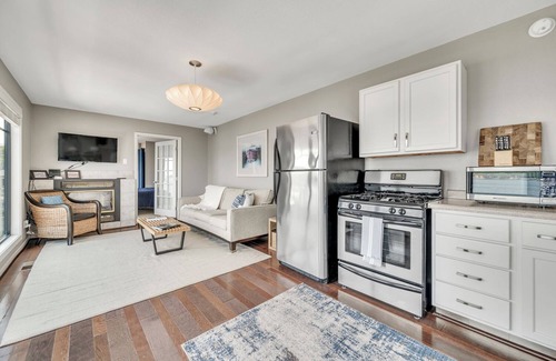 Arnolds Park Apartment | Penthouse Suite, gorgeous West Lake Okoboji views, 1 BDRM above shopping center