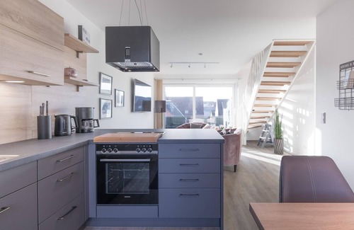 Zentrum Apartment | Penthouse Theo vacation apartment in Husum for up to 4 people