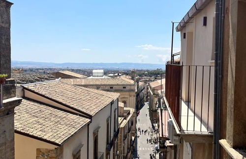 Caltagirone House | Penthouse with balcony overlooking the Caltagirone Steps