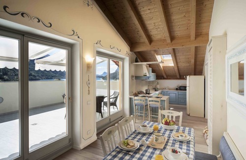 Molveno Apartment | Penthouse with lake and mountain views in Molveno