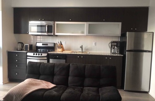Henry Farm Condo | Penthouse with parking, pool, saunas, fitness room, BBQ area and indoor carwash.