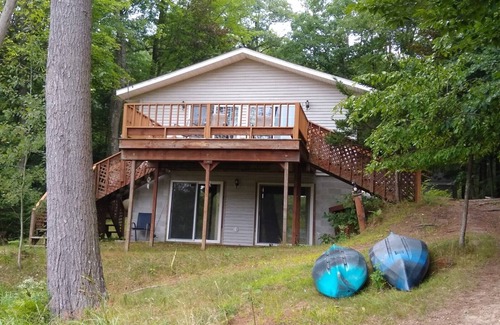 Pentwater House | Pentwater River Frontage Overlooking 100s of Wooded Acres