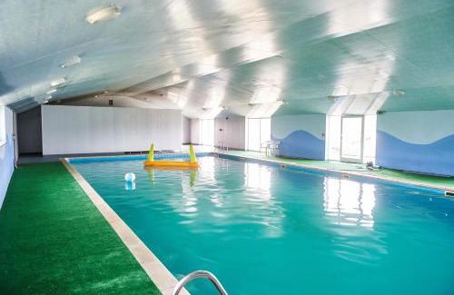 Llanybri House | Penuwch Boathouse- Lakeside rural cottage ideal for families with indoor heated pool