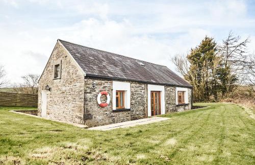 Llanybri House | Penuwch Boathouse- Lakeside rural cottage ideal for families with indoor heated pool