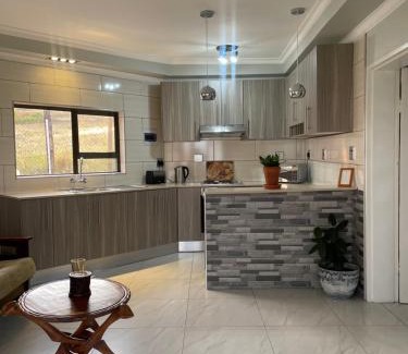 Manzini District House | Percia's Delight