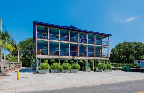 Folly Beach Apartment | Perfect Purple Palace Folly Vacation Apt C