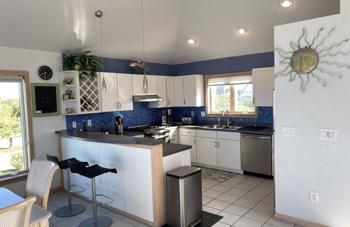 Nags Head House | Perfect setting. Great sunsets, golf course & bayside water views- Truly Unique!