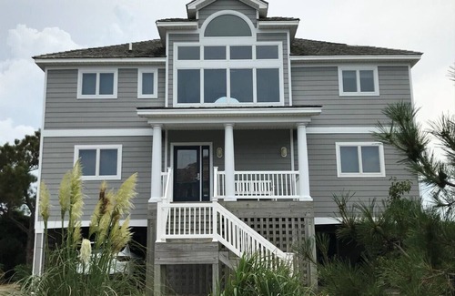 Nags Head House | Perfect setting. Great sunsets, golf course & bayside water views- Truly Unique!