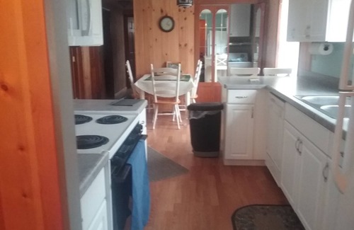 Frankfort Cottage | Perfect up north getaway. Beach front on all sport lake. Fishing winter and summer. Close to many hiking trails breweries wineries, and Lake Michigan.