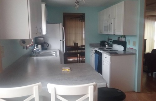 Frankfort Cottage | Perfect up north getaway. Beach front on all sport lake. Fishing winter and summer. Close to many hiking trails breweries wineries, and Lake Michigan.