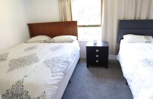 Baylys Beach House | Perfectly appointed property by the Baylys Beach adjacent to a reserve