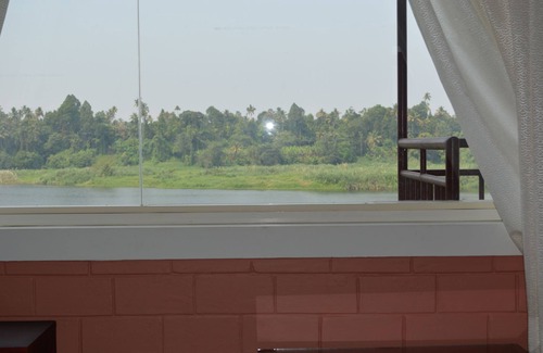 Perumbavoor Cottage | Periyar RiverView Homestay, Near Cochin Airport, Kochi | RiverView AC Rooms