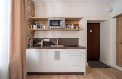 Grizinkalns Apartment | Pernavas loft-style residence with free parking