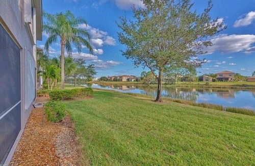 Fort Myers Condo | Pet Friendly 2 Bedroom 2 Bath Ground Floor Condo w/Lake View in Colonial CC.