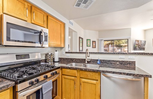 Kaufman And Broad At The Vineyards Condo | Pet Friendly! 2 KING Beds, Heated Community Pool! 3 miles from Cardinal Stadium!