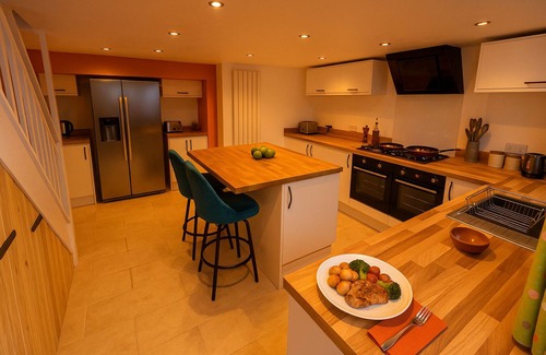 Port Talbot House | Pet-friendly accommodation with fenced garden 2 bedrooms, Secure bike shed .Cozy log burner Netflix